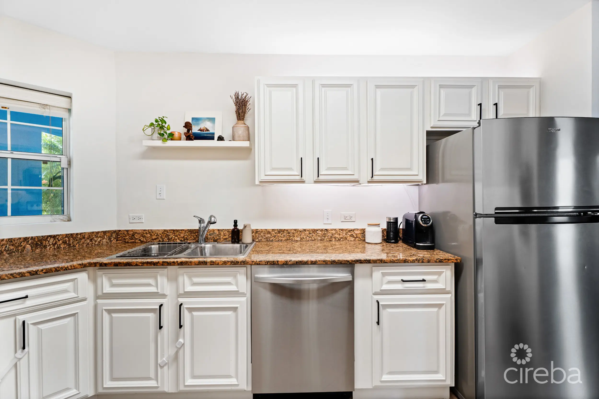 20260407144826 08Stefan PriorGregg ArnoldCayman Crossing 33 2 Bed TownhomeProperty Cayman Real Estate