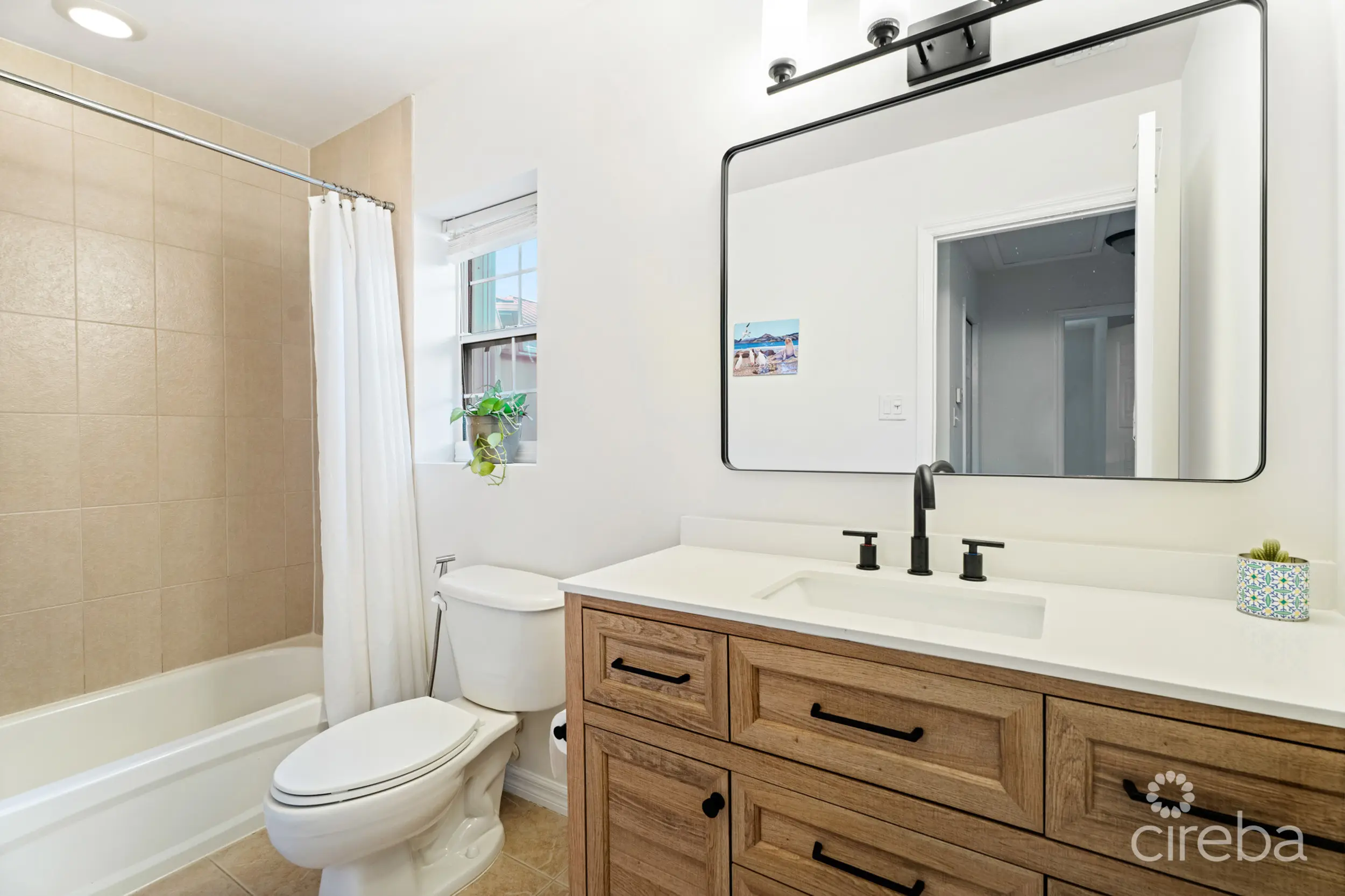 20260407144834 15Stefan PriorGregg ArnoldCayman Crossing 33 2 Bed TownhomeProperty Cayman Real Estate