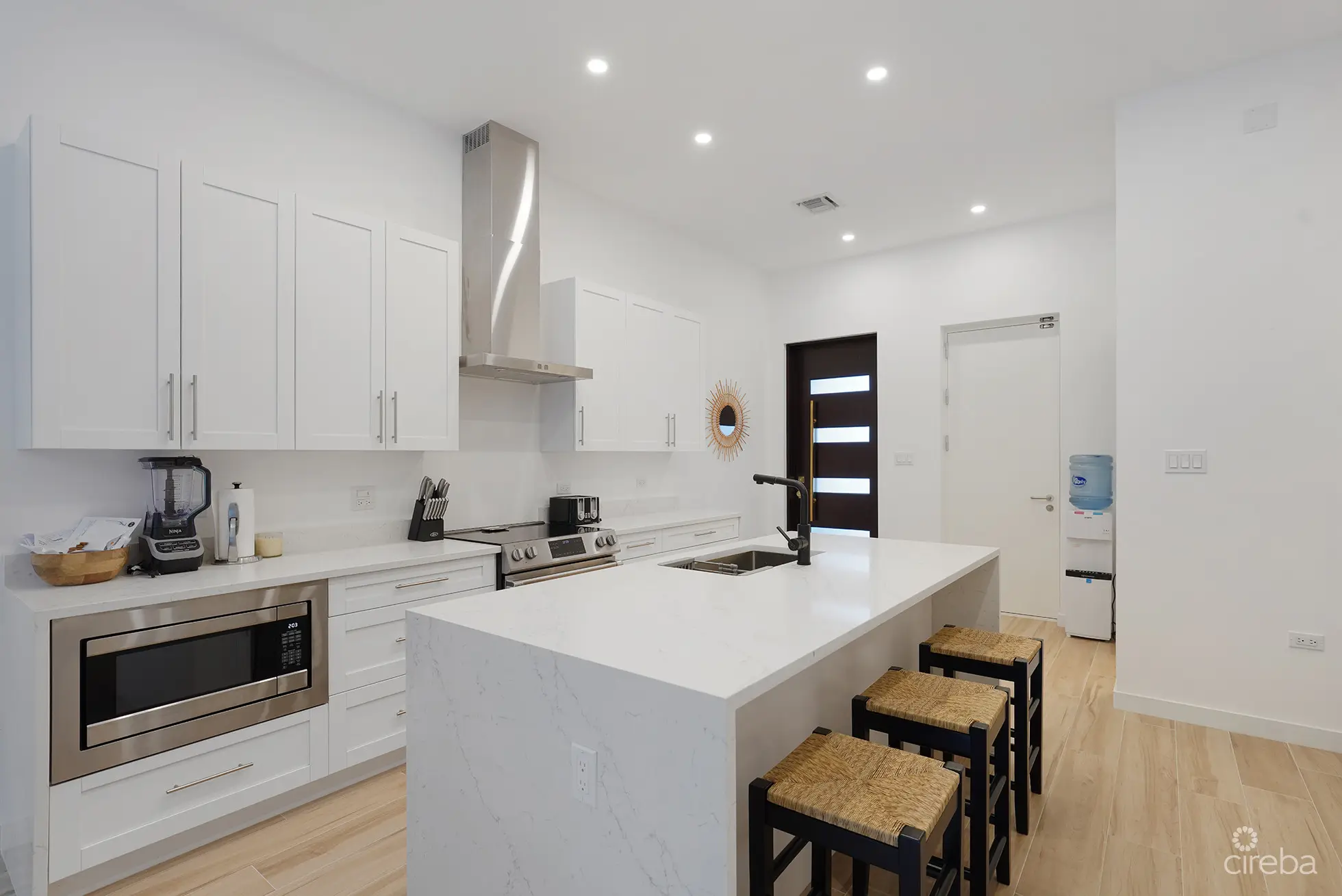 20260424122516 Lotus 14 Kitchen Island to front door