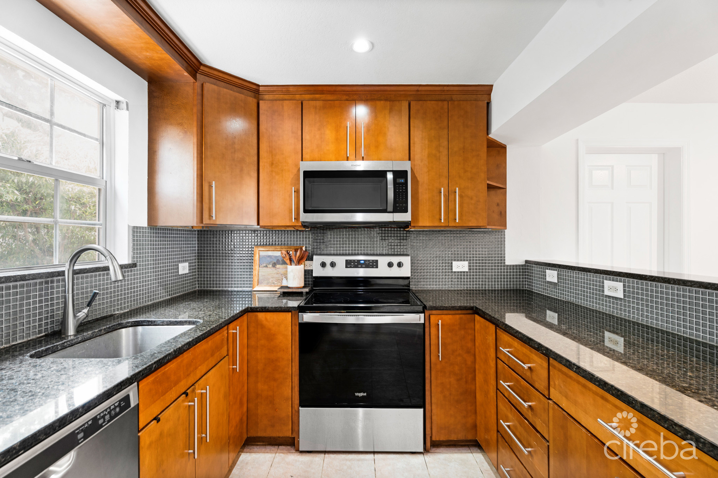 20260604164646 8Gregg ArnoldCaribbean Courts 8bProperty Cayman Real Estate