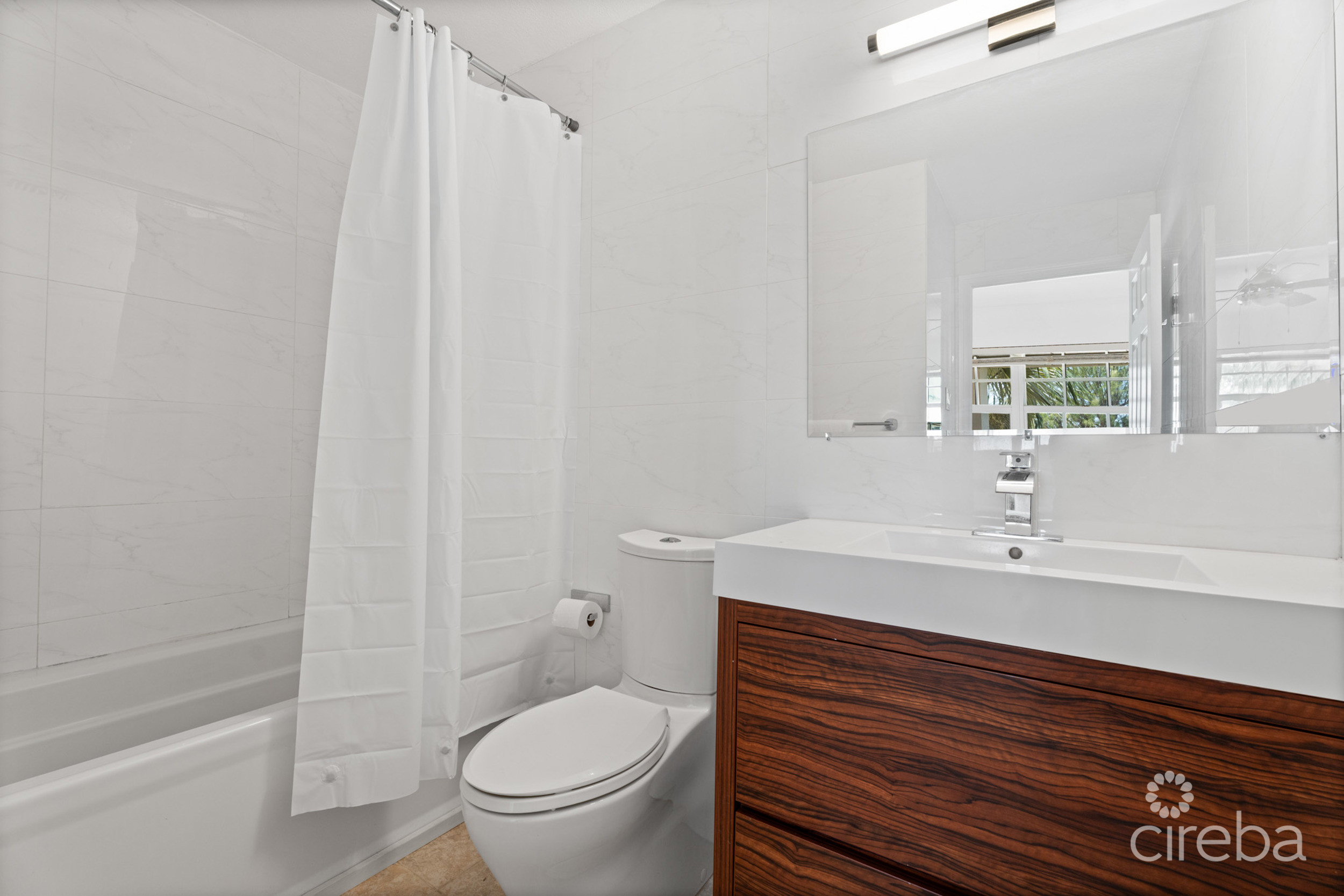 20260604164707 12Gregg ArnoldCaribbean Courts 8bProperty Cayman Real Estate