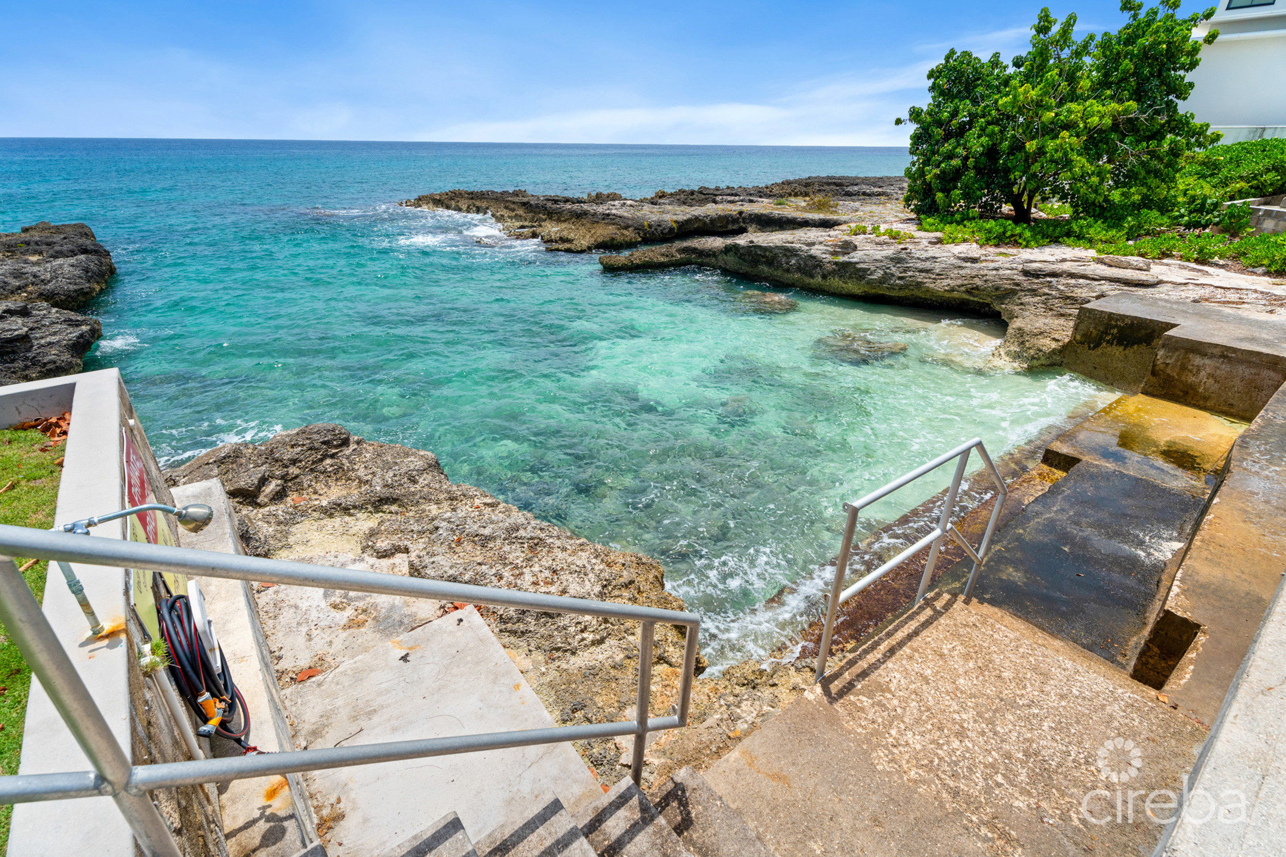 20260604164715 22Gregg ArnoldCaribbean Courts 8bProperty Cayman Real Estate