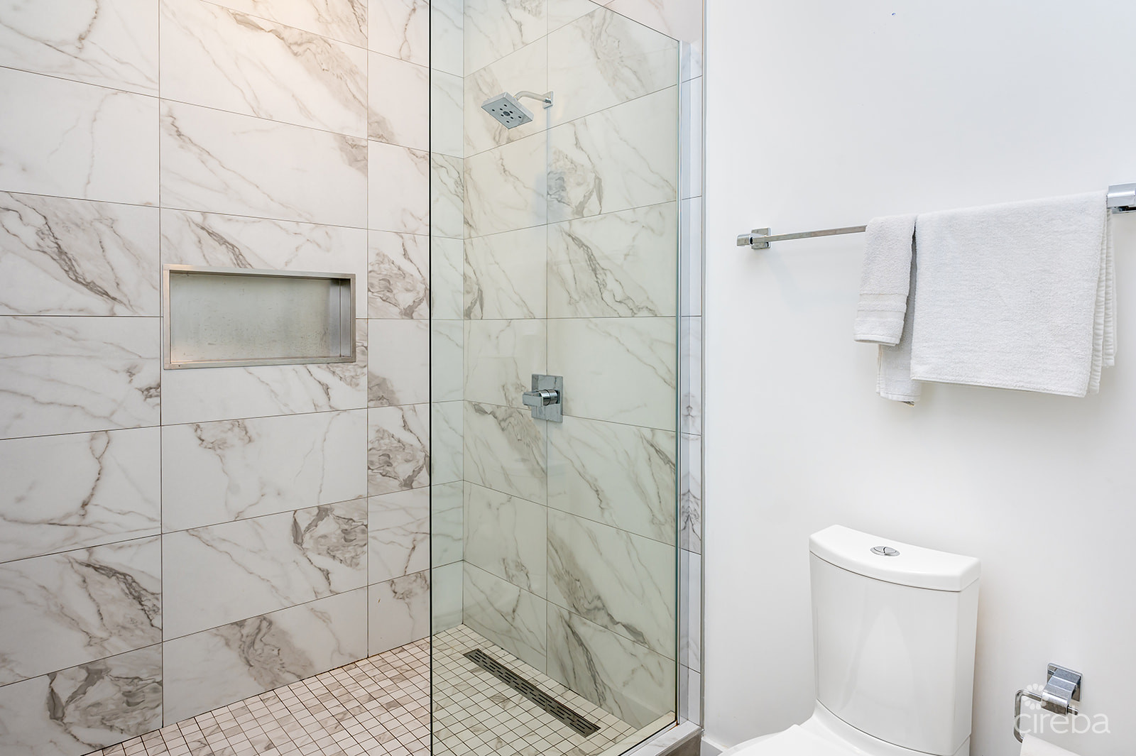 20260617114427 7Gregg ArnoldVivi 8Property Cayman Real Estate