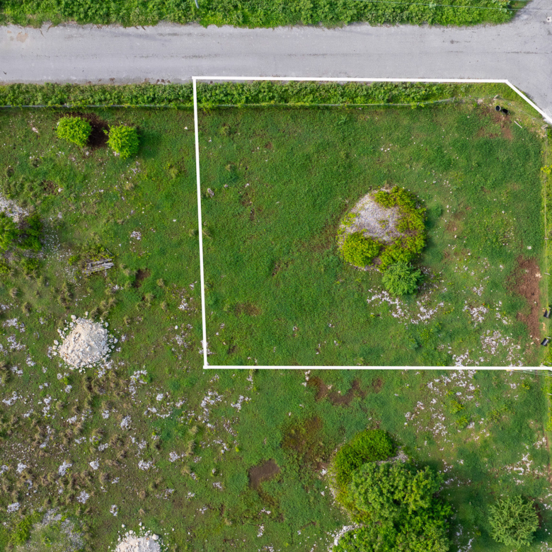 20260703121506 Premiere Drive land lot Photograph 1 Highlighted