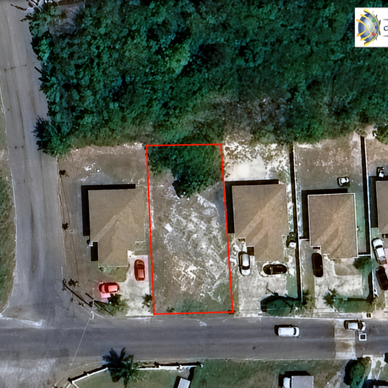 WEST BAY RESIDENTIAL LOT WITH APPROVED 3 BED/2 BATH PLANS AND BUILDING PERMIT.