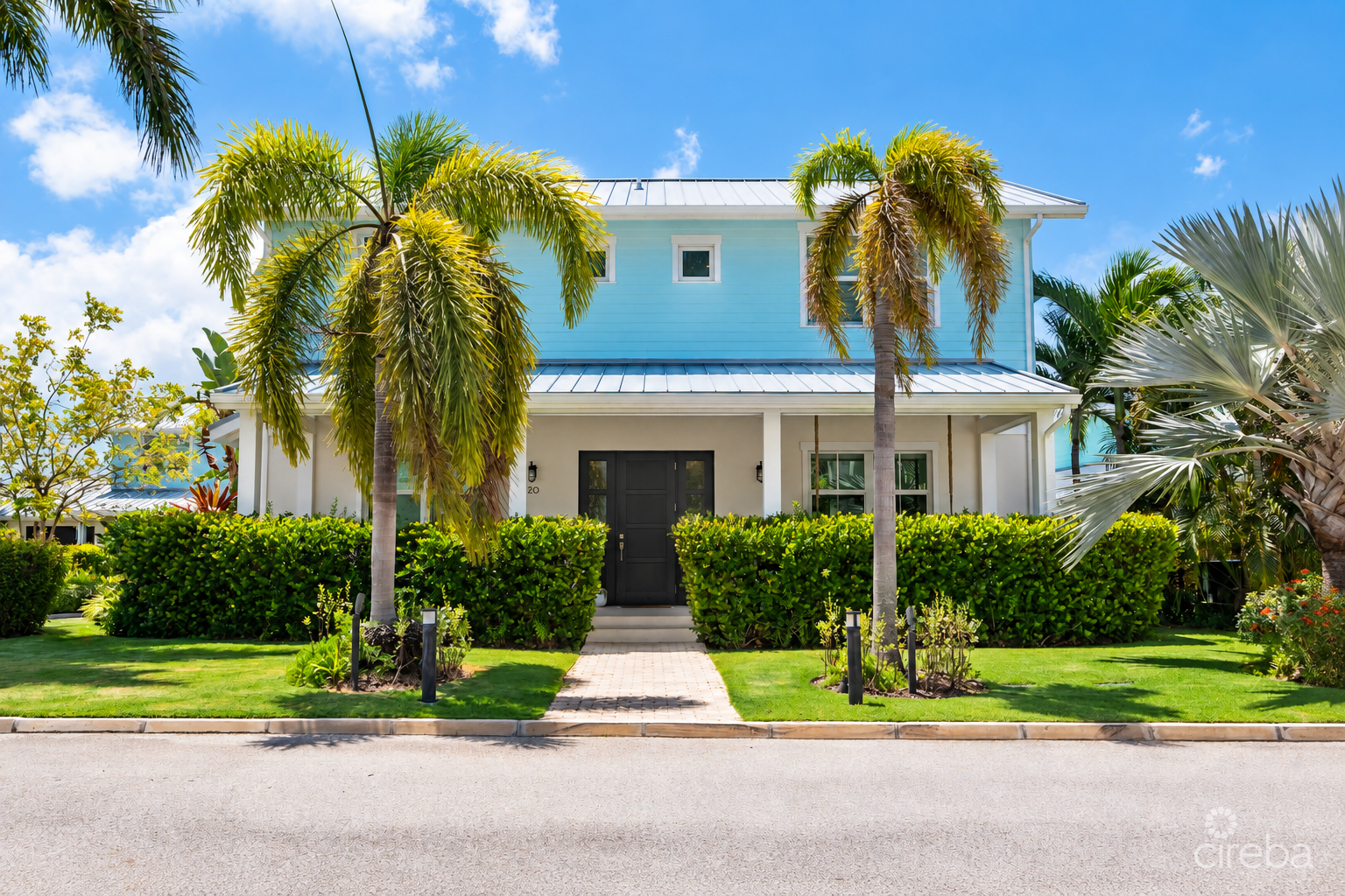 20261005143104 Sunny Tropical House with Palm Landscaping
