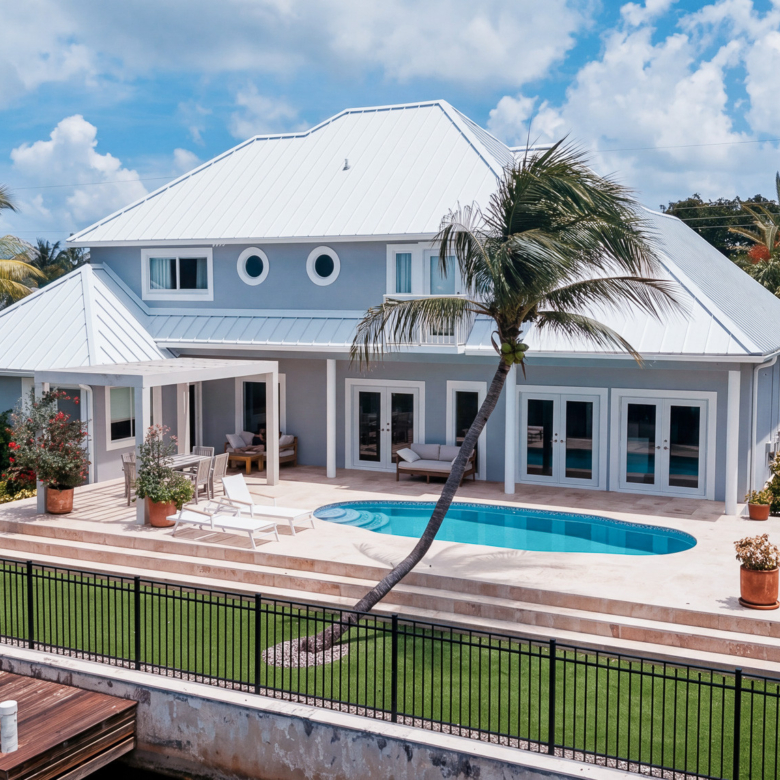 GOVERNORS HARBOUR – 266 RALEIGH HARBOUR NORTH EXECUTIVE CANAL-FRONT HOME