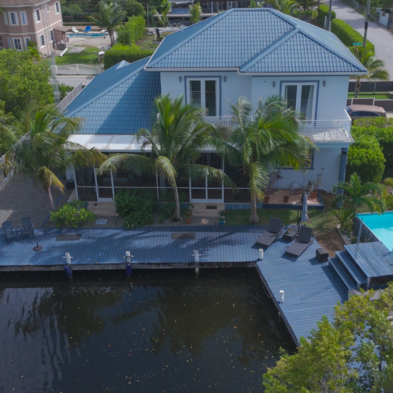 SUN ROSE CANAL FRONT HOME – NORTH SOUND ESTATES
