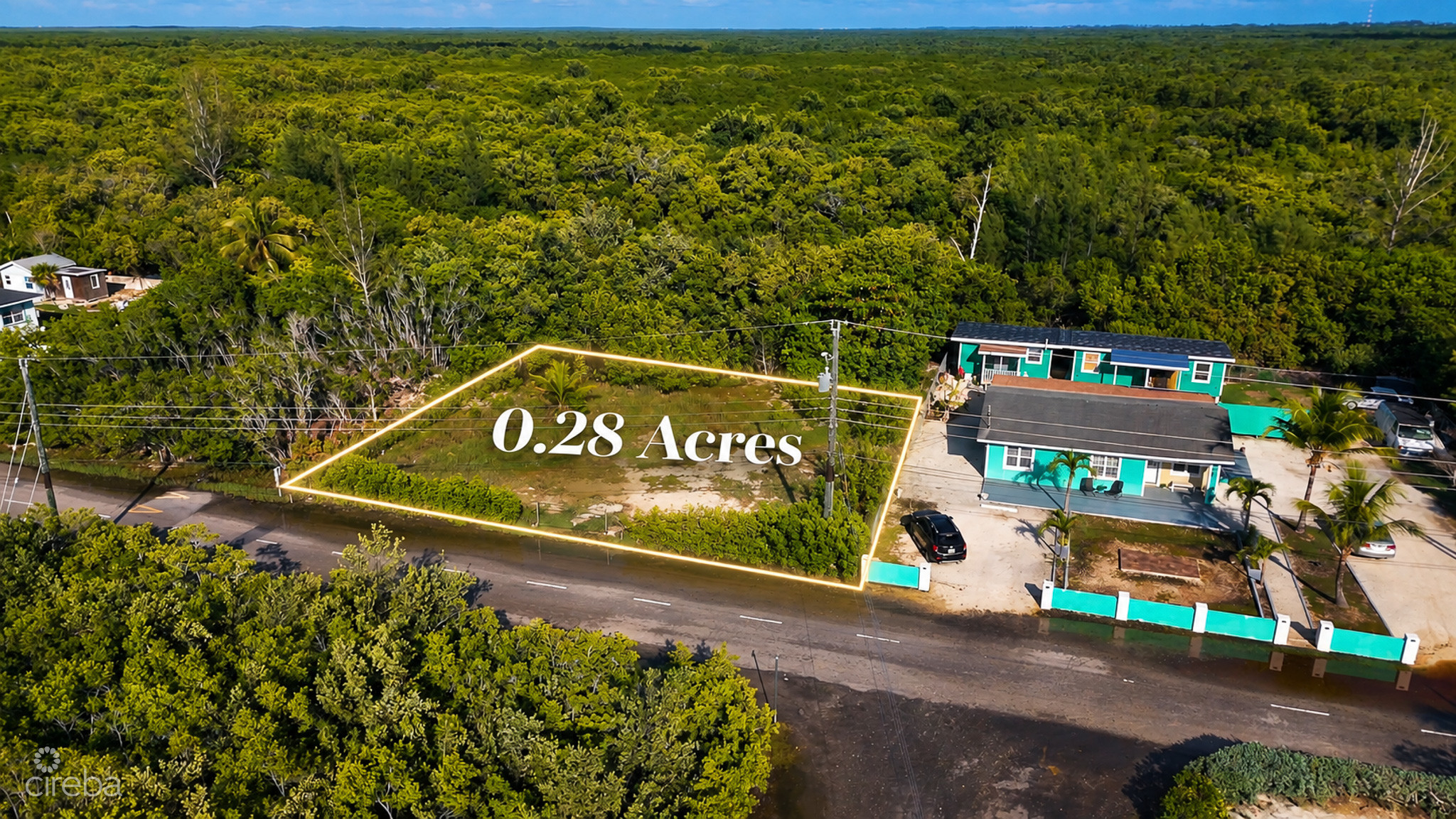 20261008145849 Aerial Highlighted Tropical Lot for Sale