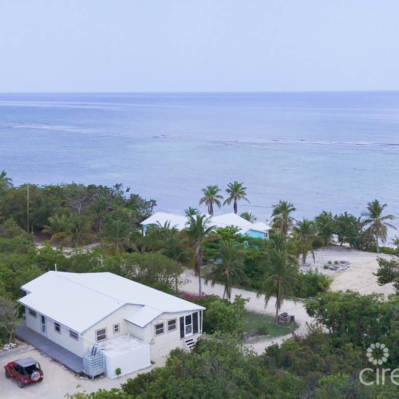 LITTLE CAYMAN OCEAN VIEW RESIDENTIAL HOME W/ BEACHFRONT LOT JUST SHY OF 1 ACRE